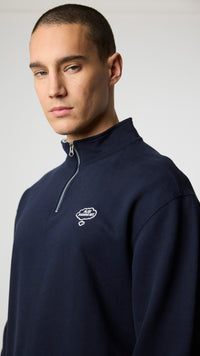 NAVY BANK HALF ZIP CREW